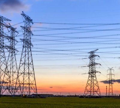High voltage electricity tower sky sunset landscape,industrial background.